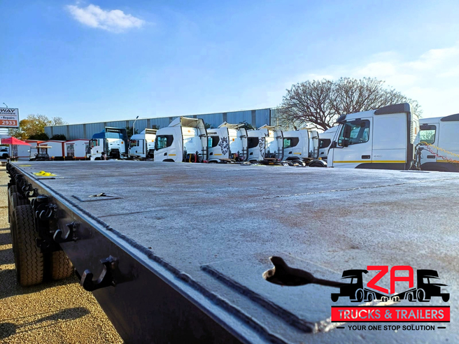2023 HENRED FRUEHAUF TRI-AXLE FLAT DECK